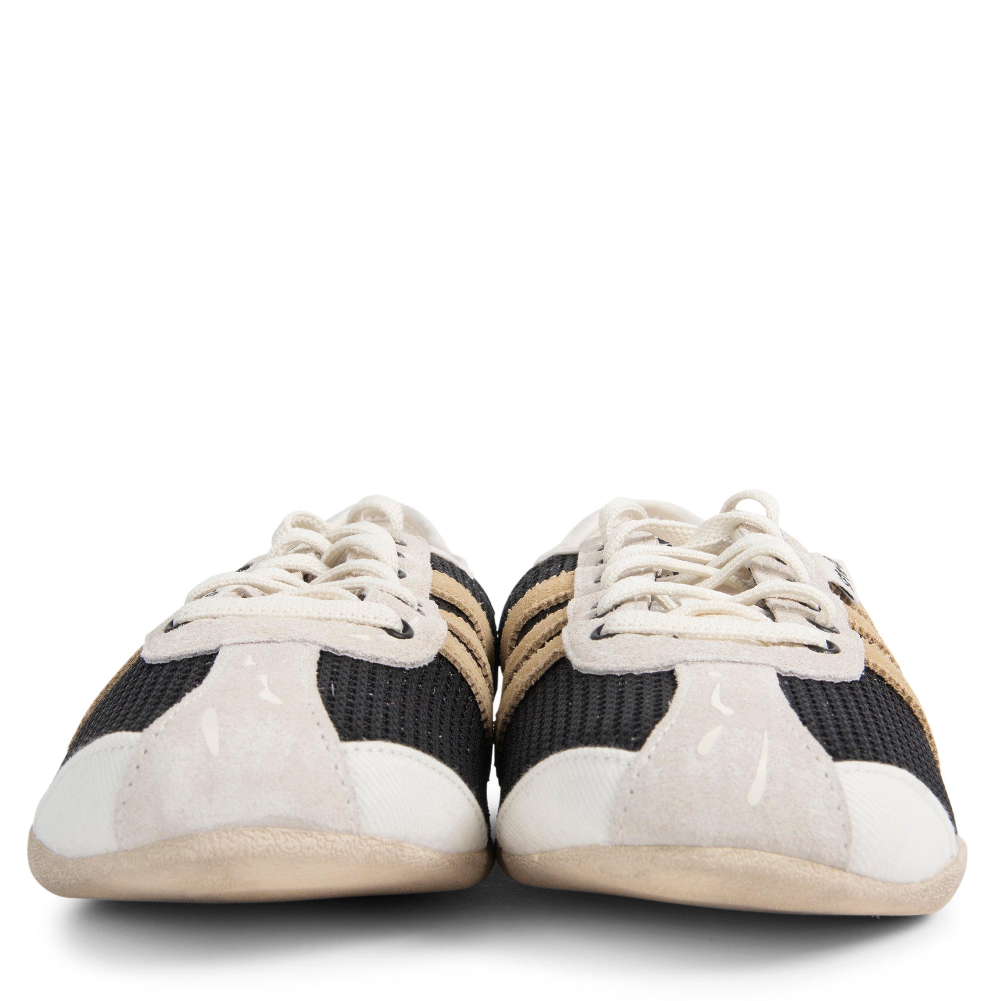 Pair of black and white sneakers on a white background