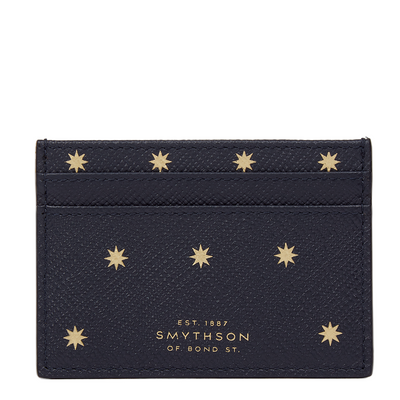 Smythson navy cardholder with gold star patterns and Smythson branding at Pockets