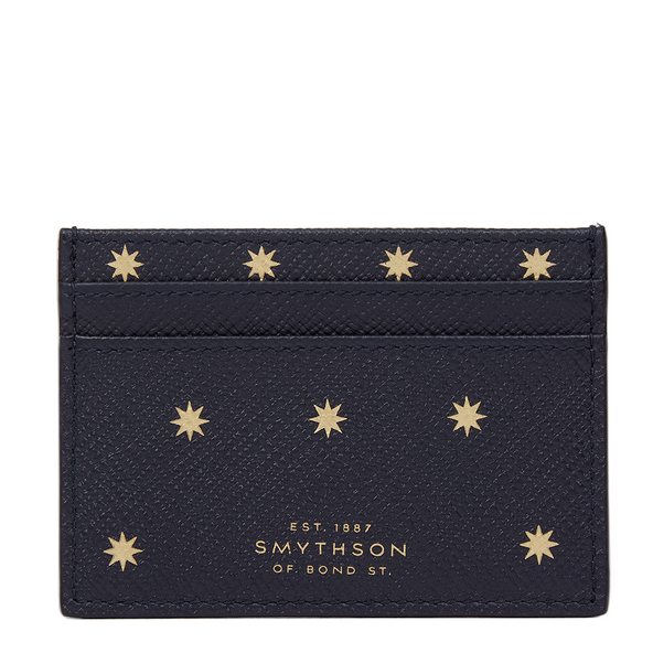 Smythson navy cardholder with gold star patterns and Smythson branding at Pockets
