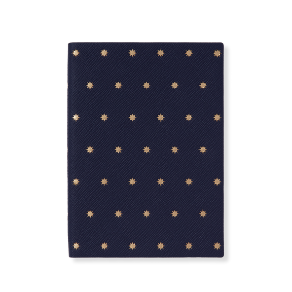 Smythson Soho Navy Notebook with star-embossed leather background at Pockets