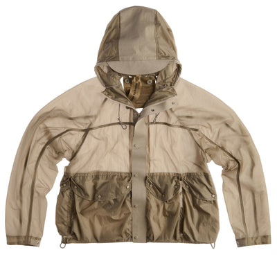 Beige jacket with transparent panels on a light gray background