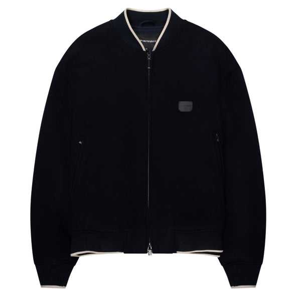 Black jacket with white trim on a white background