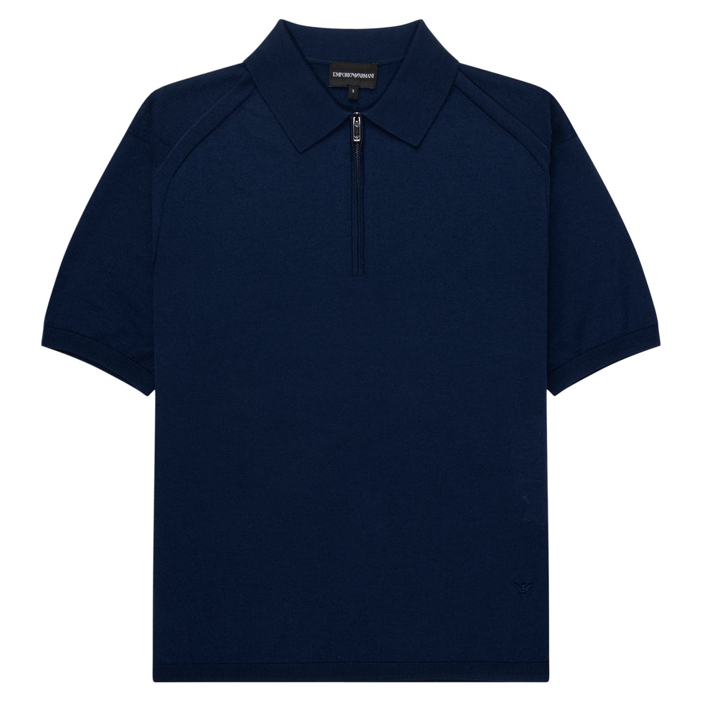 Navy polo shirt with a quarter zip on a white background