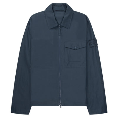 Stone Island Ghost overshirt in monochrome organic cotton canvas with tonal badge, minimalist design, windproof and breathable fabric that swells when wet for natural weather resistance.