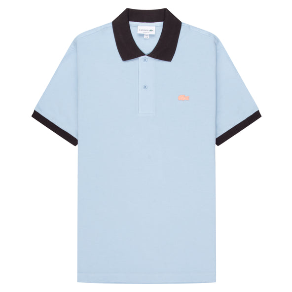 Lacoste Blue/Navy Trim Miami Blossom Polo in soft blue palette is anchored by navy contrast ribbing at the collar and cuffs