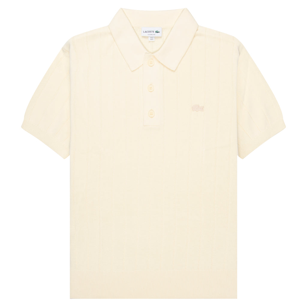 Lacoste Cream Heavy Knitted Tennis Polo with a brand logo on the chest
