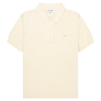 Lacoste Cream Heavy Knitted Tennis Polo with a brand logo on the chest