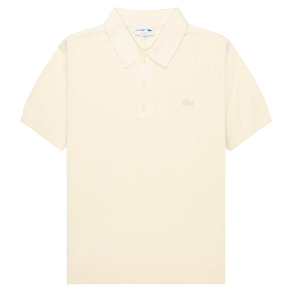 Lacoste Cream Heavy Knitted Tennis Polo with a brand logo on the chest