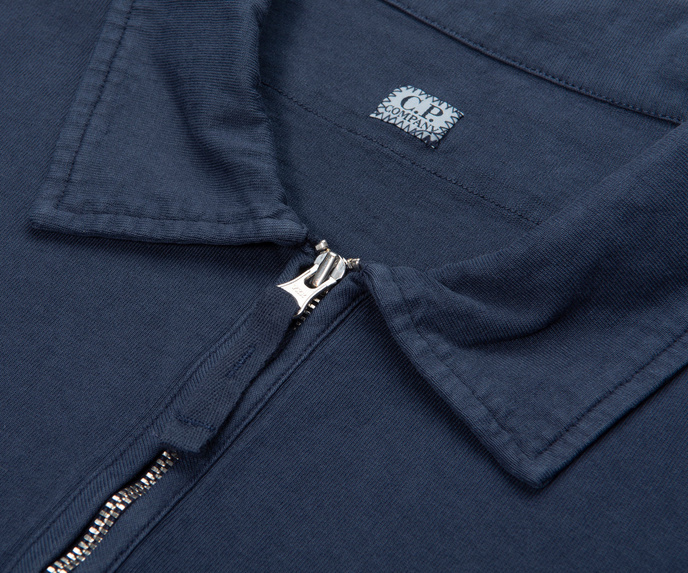 C.P. Company Indigo Script Logo Zip Polo