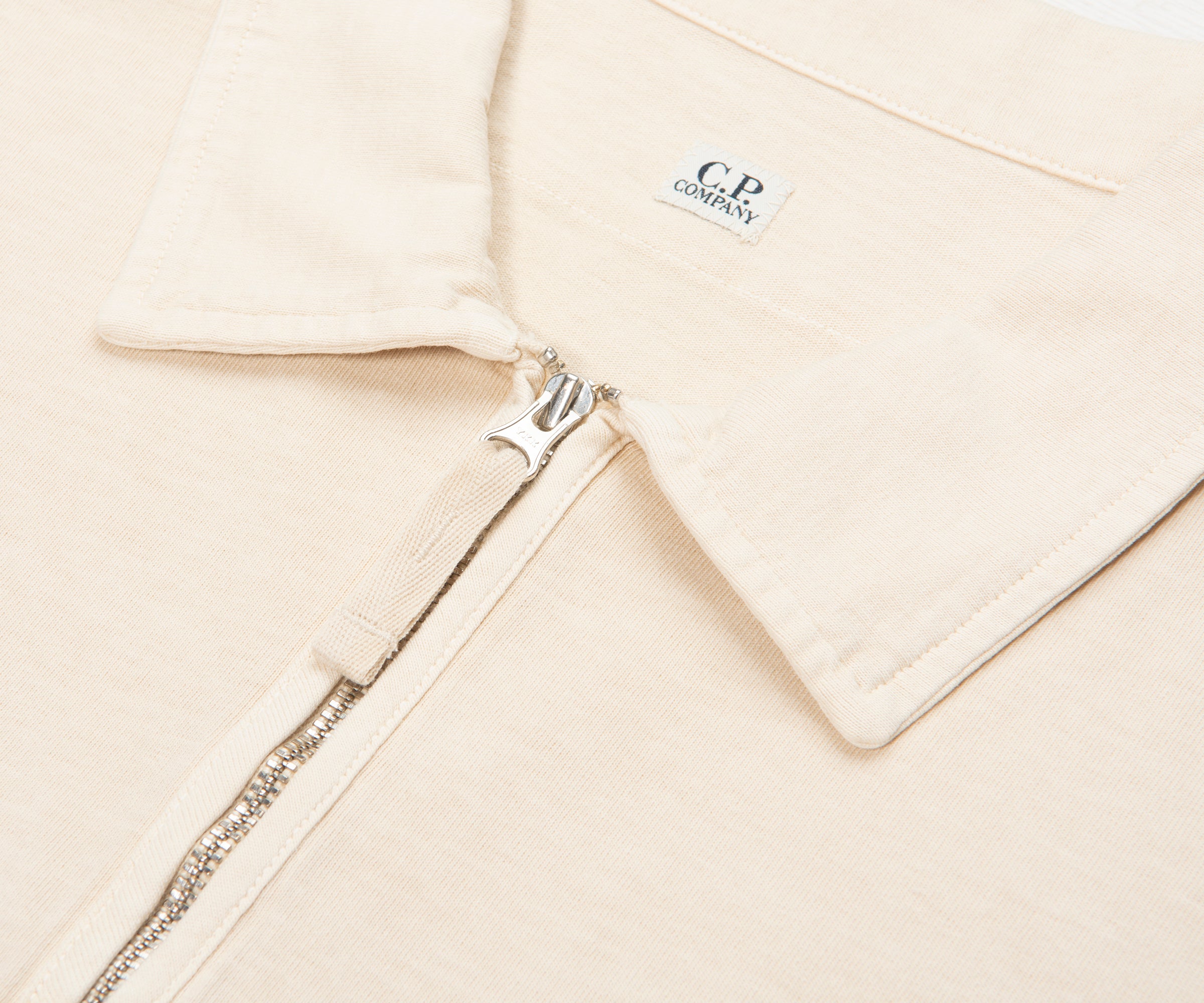 C.P. Company Dew Script Logo Zip Polo