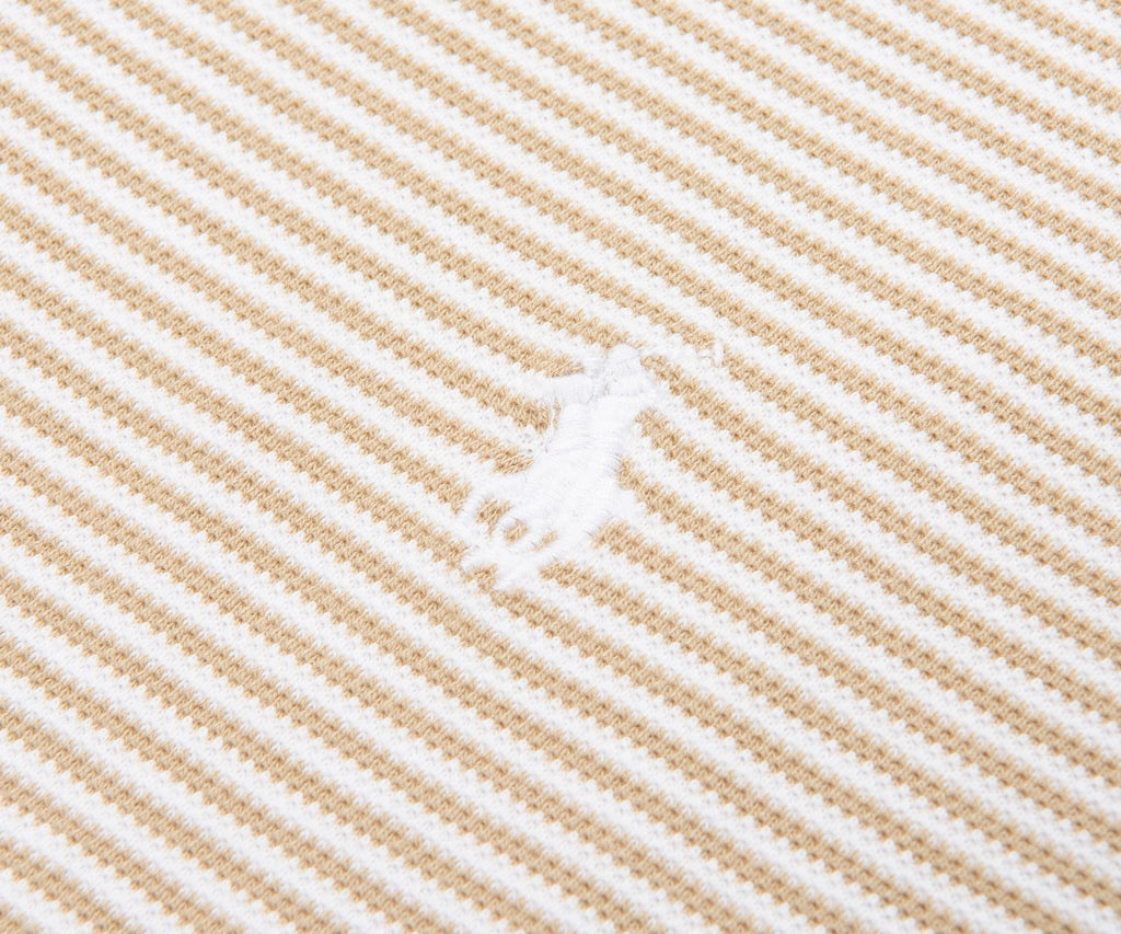 Close-up of beige and white striped fabric texture