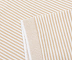 Close-up of beige and white striped fabric texture