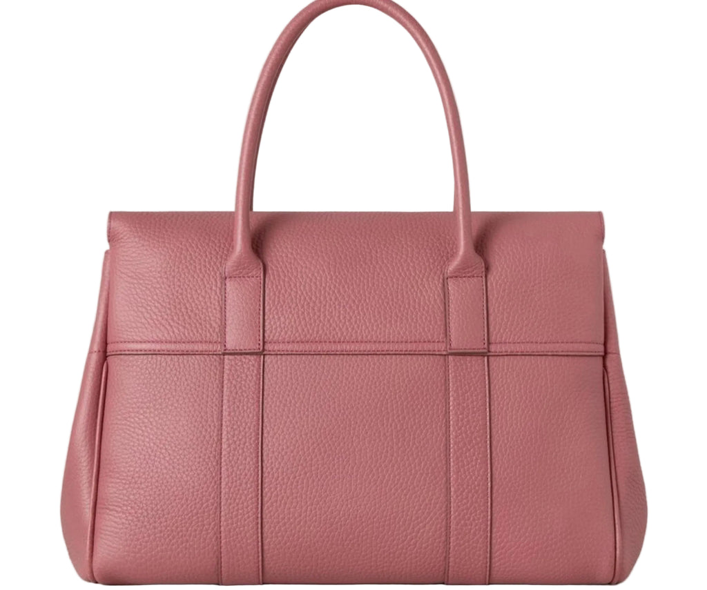 Pink handbag on a light gray background
