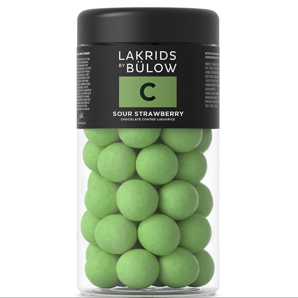 Jar of green sour strawberry candies with black lid labeled 'Lakrids by Bülow'.