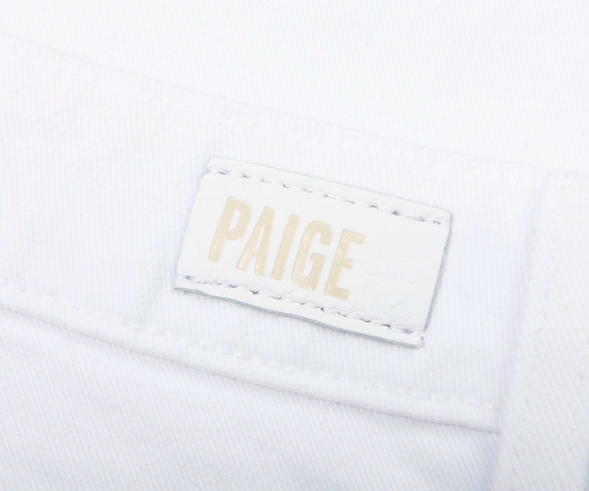 Label with 'PAIGE' text on a white background