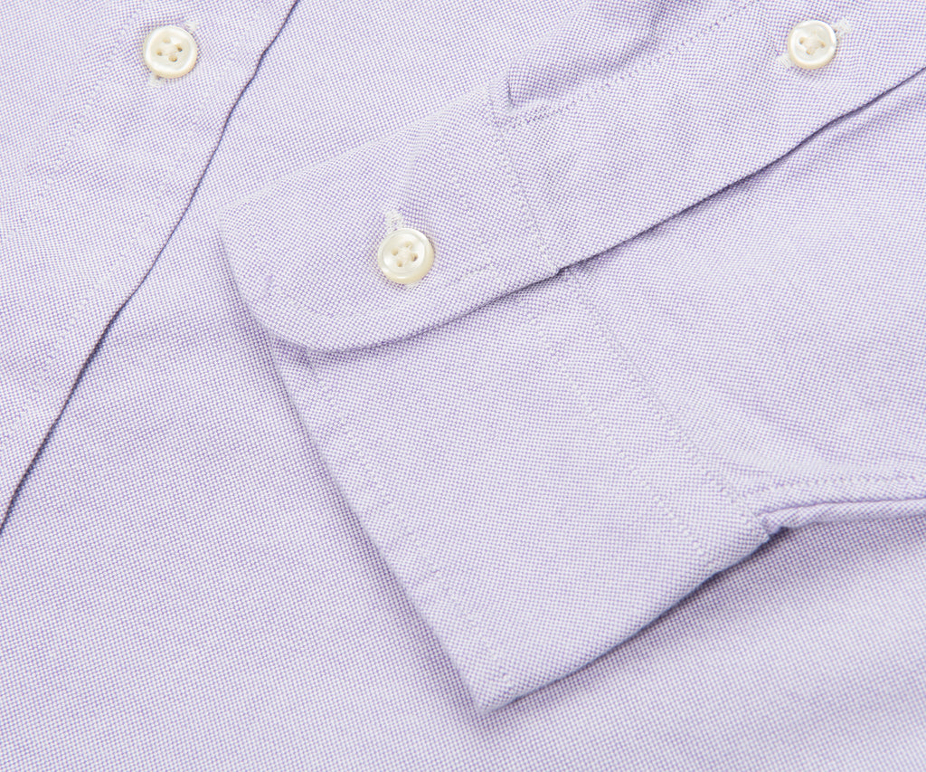 Close-up of a light purple shirt with button details