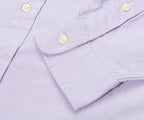 Close-up of a light purple shirt with button details