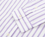 Close-up of a folded purple and white striped shirt