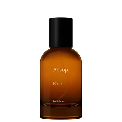 Aesop Rozu rose fragrance with shiso leaf, warm woods, subtle spice, and soft smoky undertones for a refined, modern floral scent.