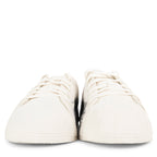 Pair of white sneakers on a white background