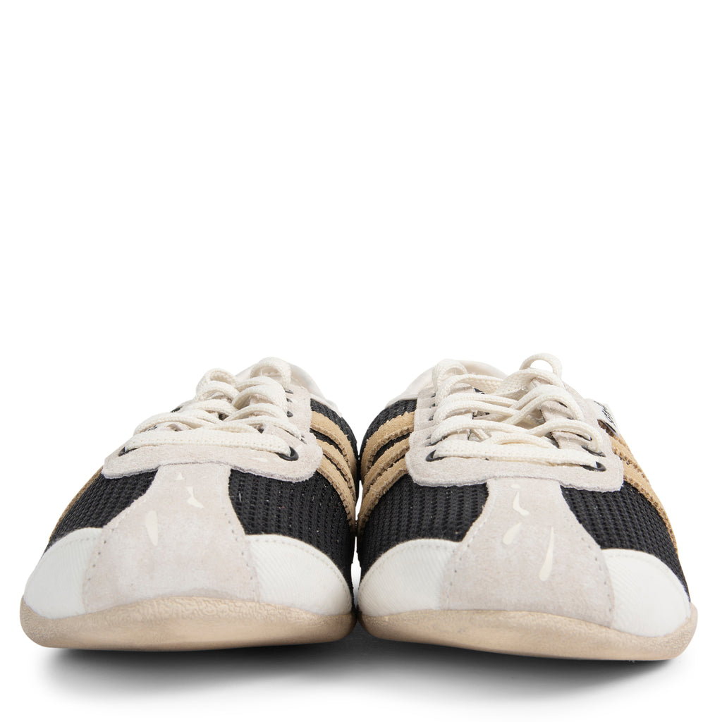Pair of black and white sneakers on a white background
