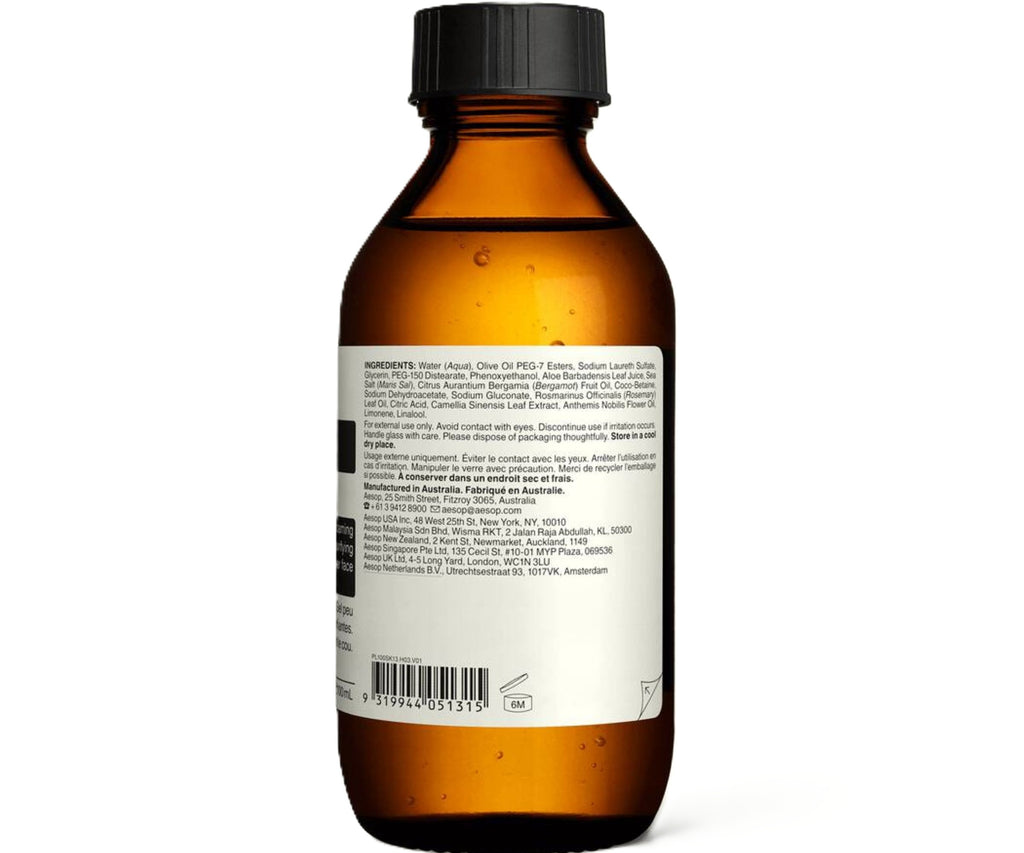 Brown bottle with black cap on a white background