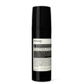 Aesop protective facial lotion bottle on a white background