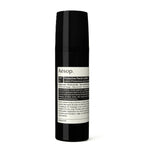 Aesop protective facial lotion bottle on a white background