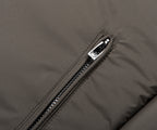 Close-up of a zipper on a gray jacket