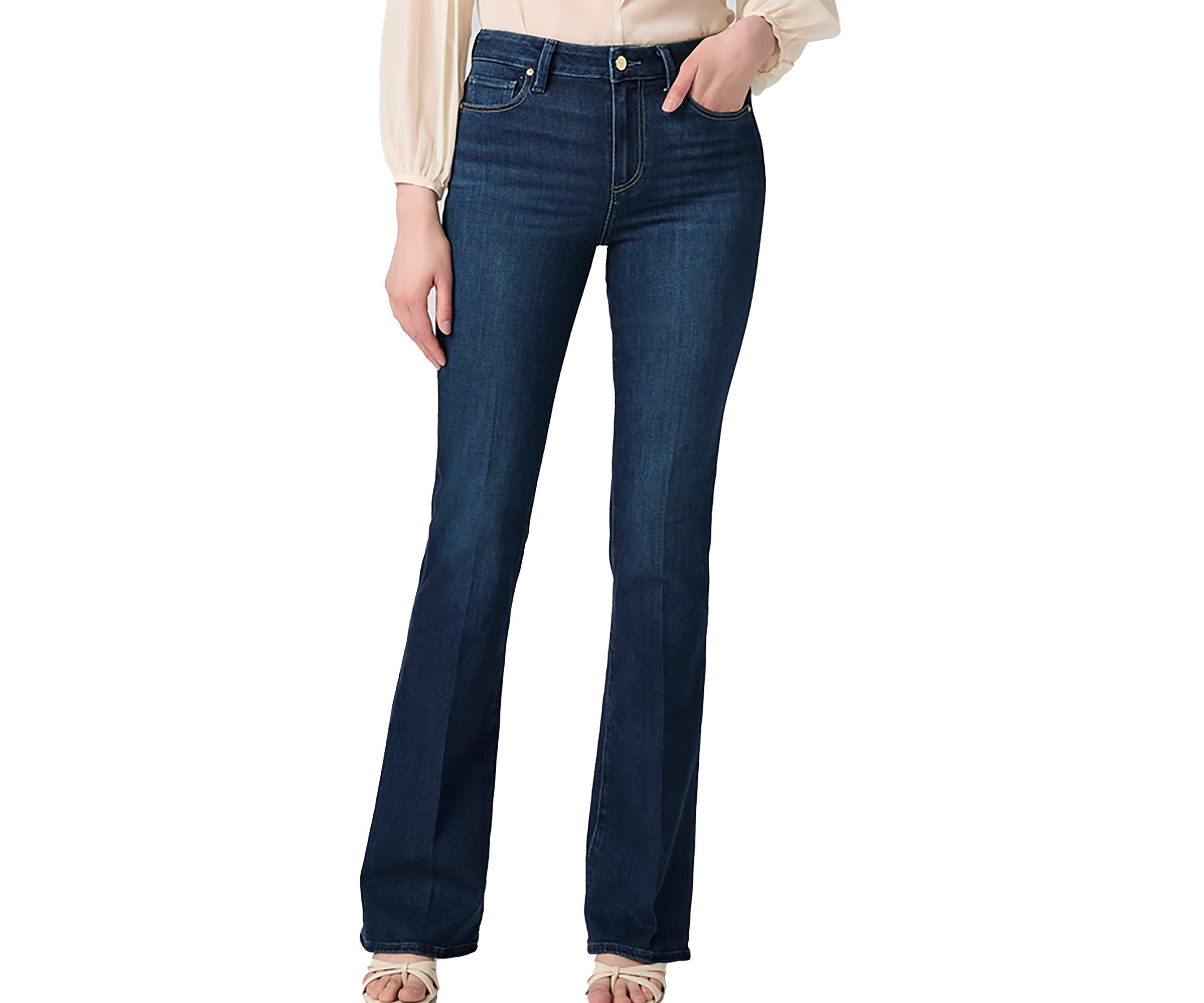 Person wearing blue jeans on a white background