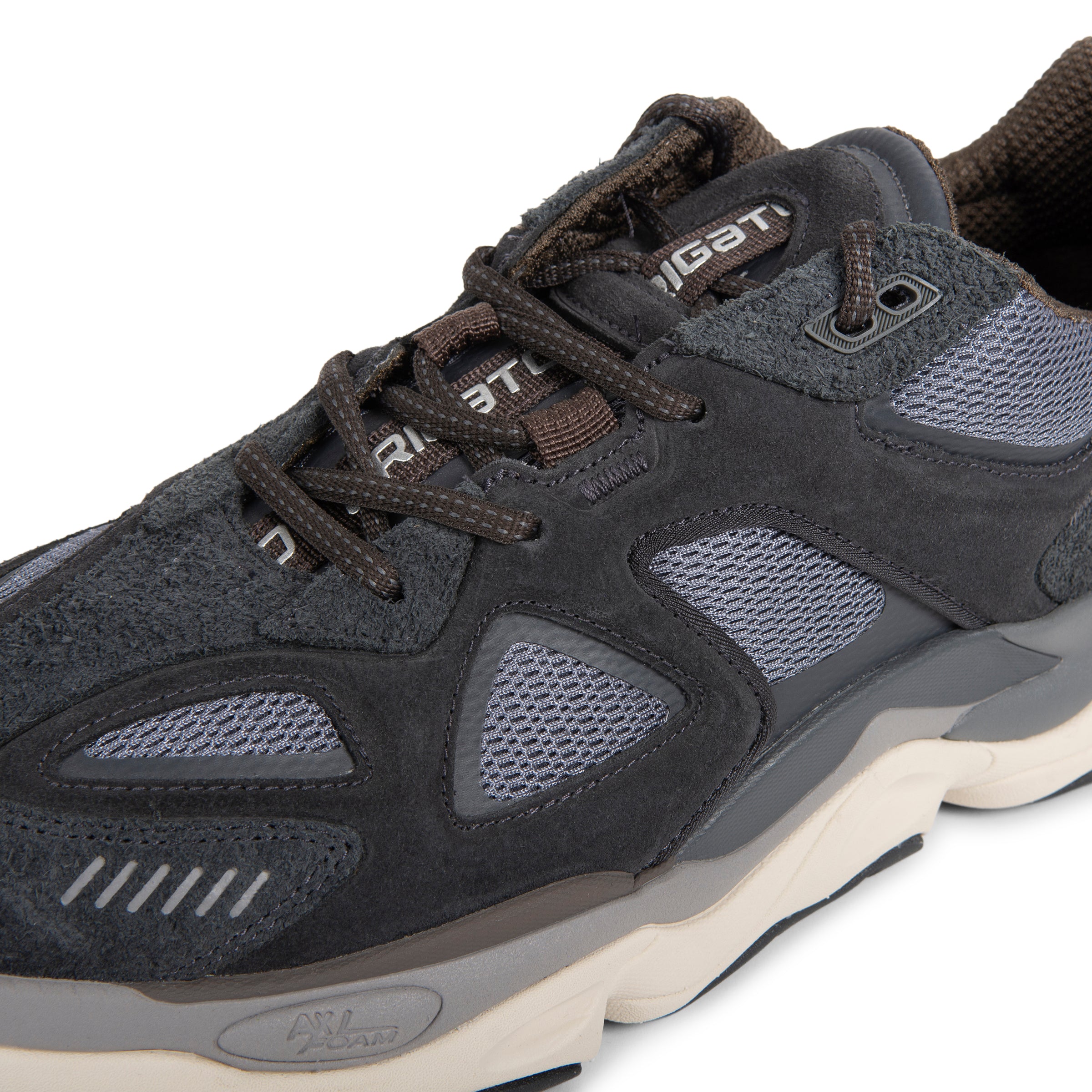 Black and gray athletic shoe with visible brand logo on a white background