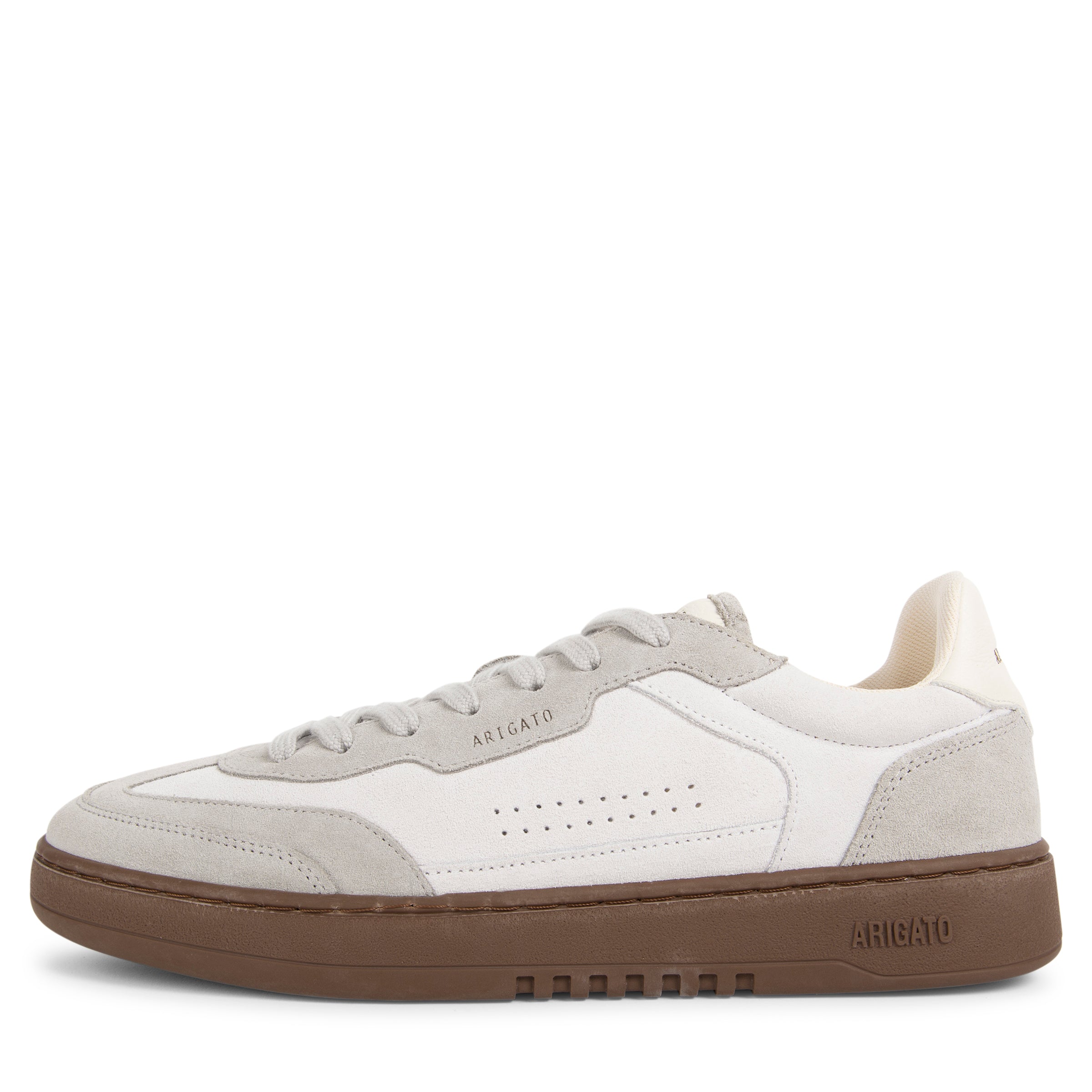 White and gray sneaker with brown sole on a white background