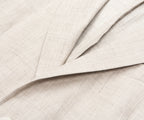 Close-up of beige fabric with a subtle texture