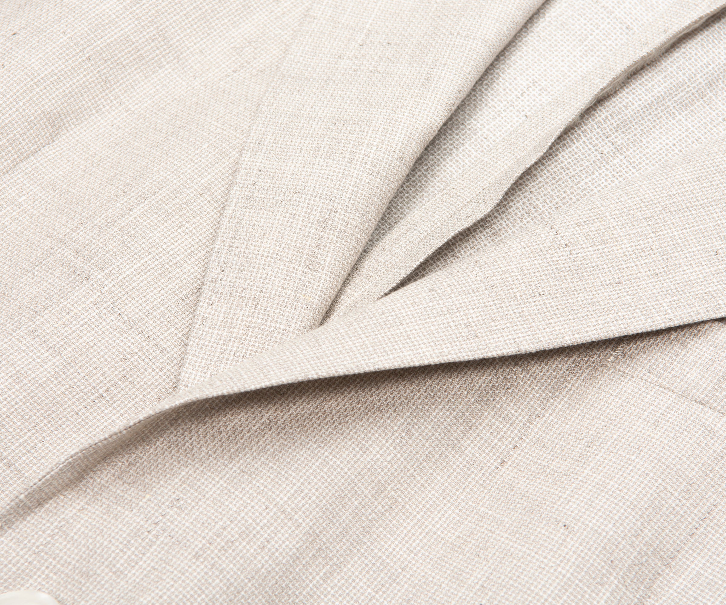 Close-up of beige fabric with a subtle texture
