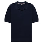 Navy blue polo shirt on a white background