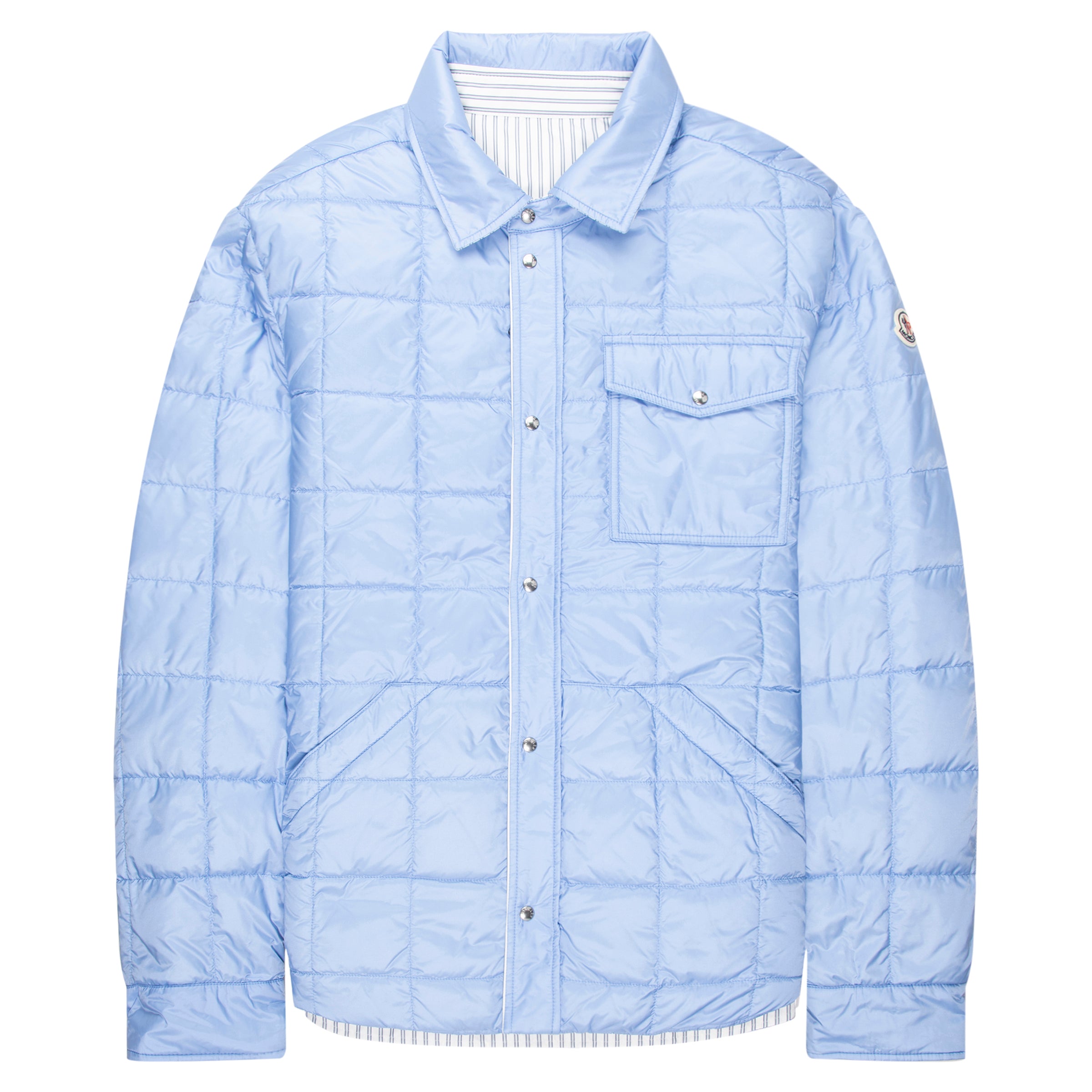 Light blue quilted jacket on a white background