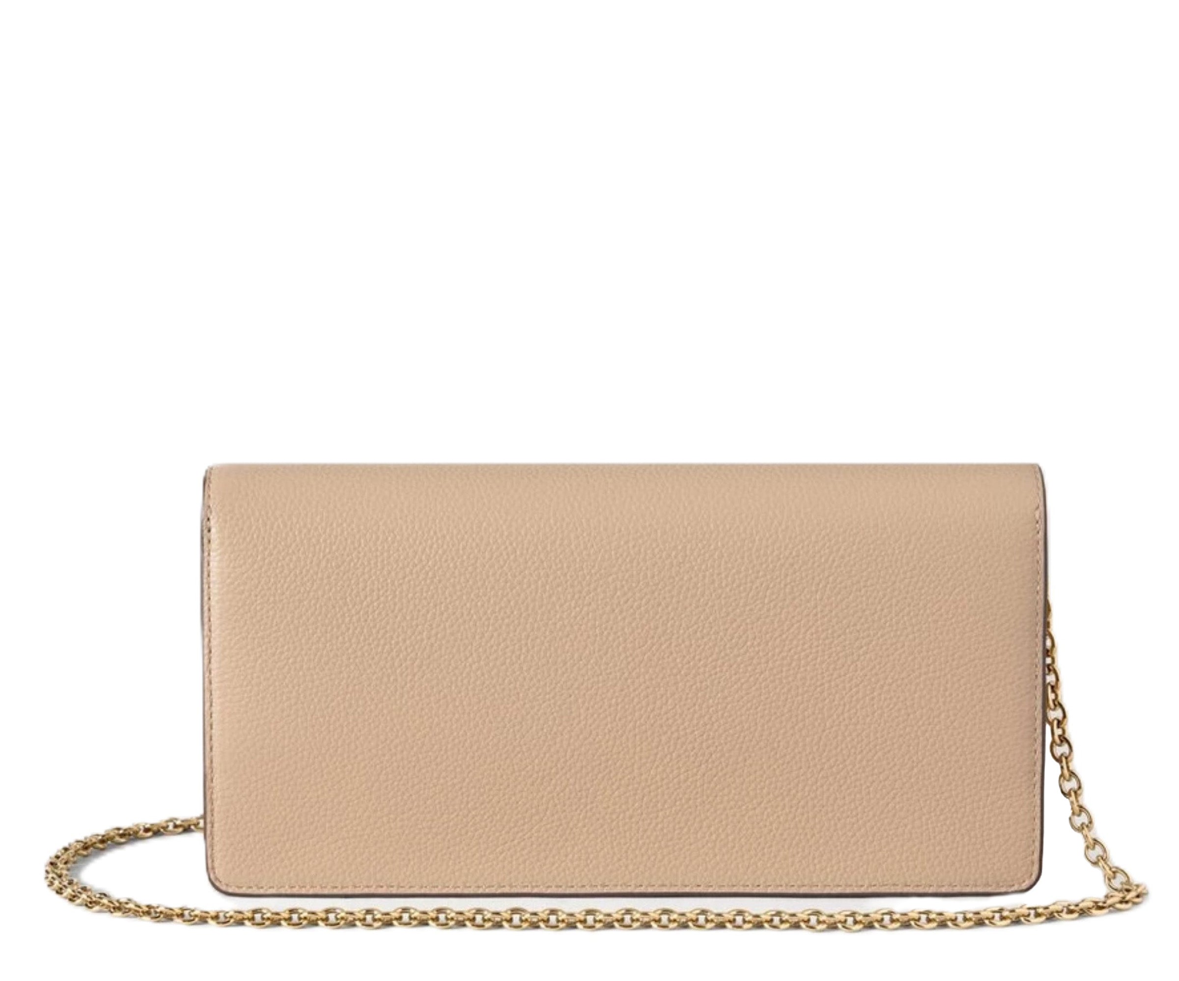Black quilted handbag on a light gray background
