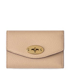 Beige wallet with a gold clasp on a white background