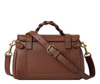Brown leather handbag with gold hardware on a white background