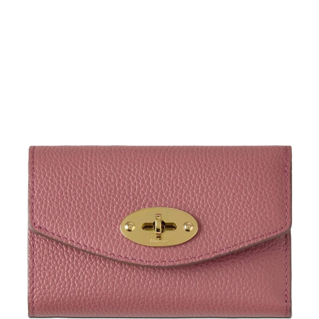 Pink wallet with a gold clasp on a white background