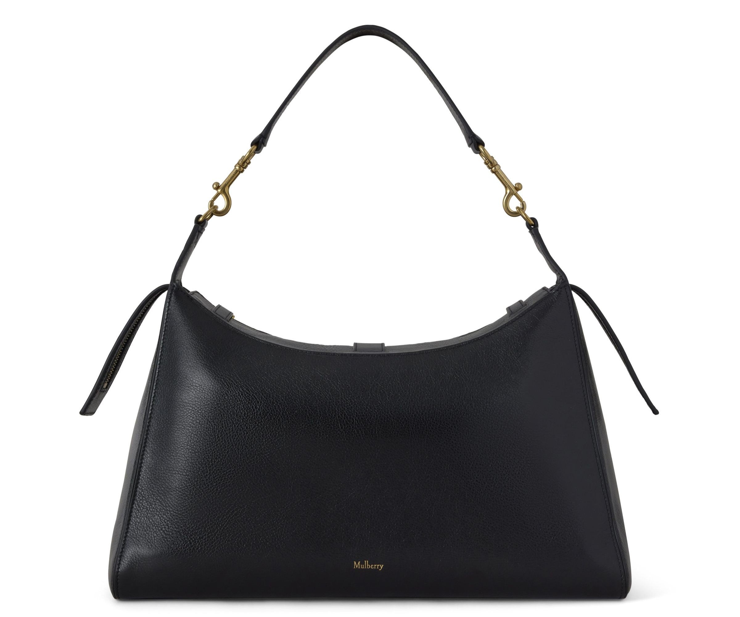 Black handbag with gold hardware on a white background
