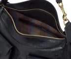 Black leather handbag with gold zipper and plaid lining on a white background