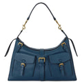 Blue handbag with gold hardware on a white background