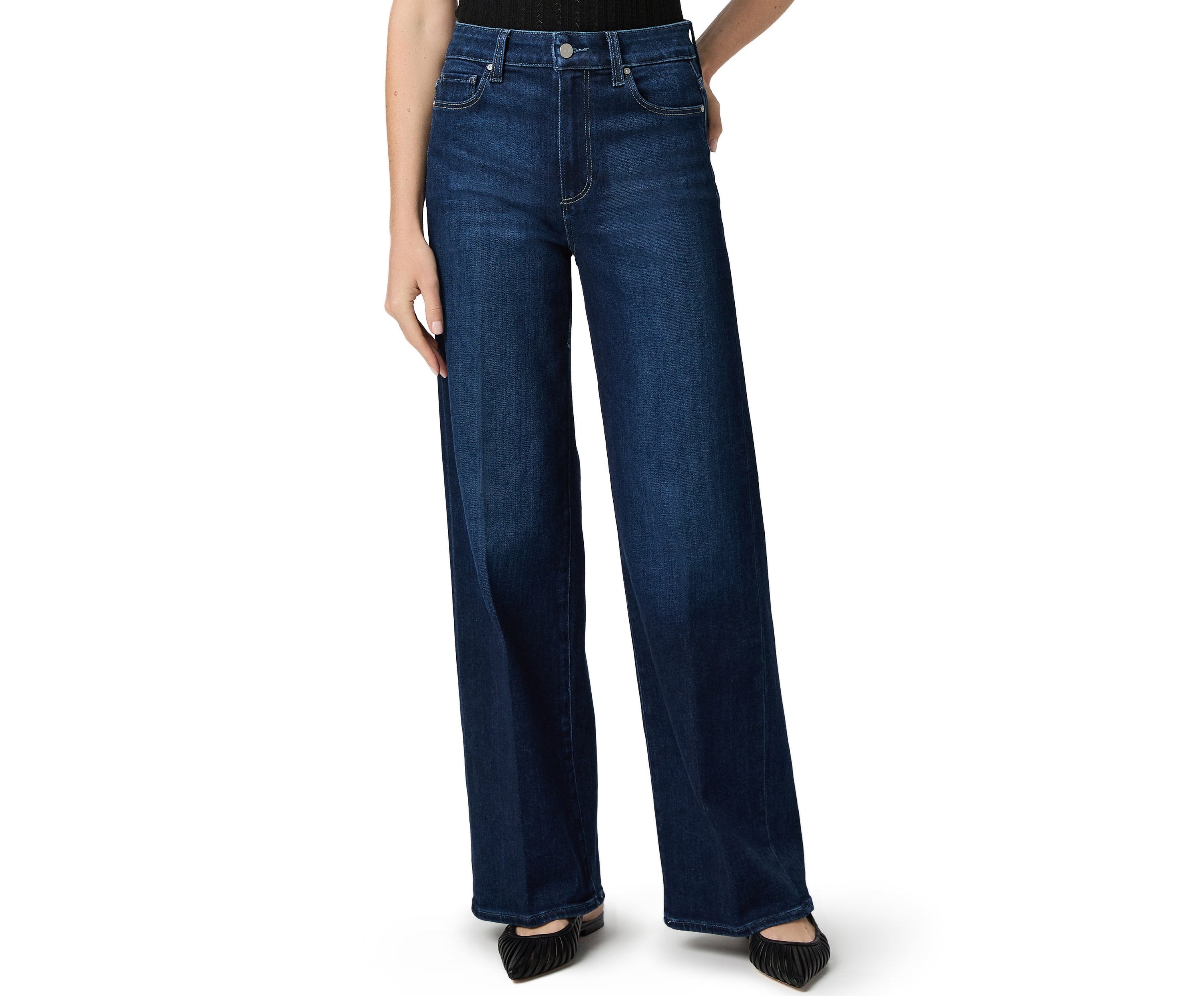 Blue jeans worn by a person on a white background