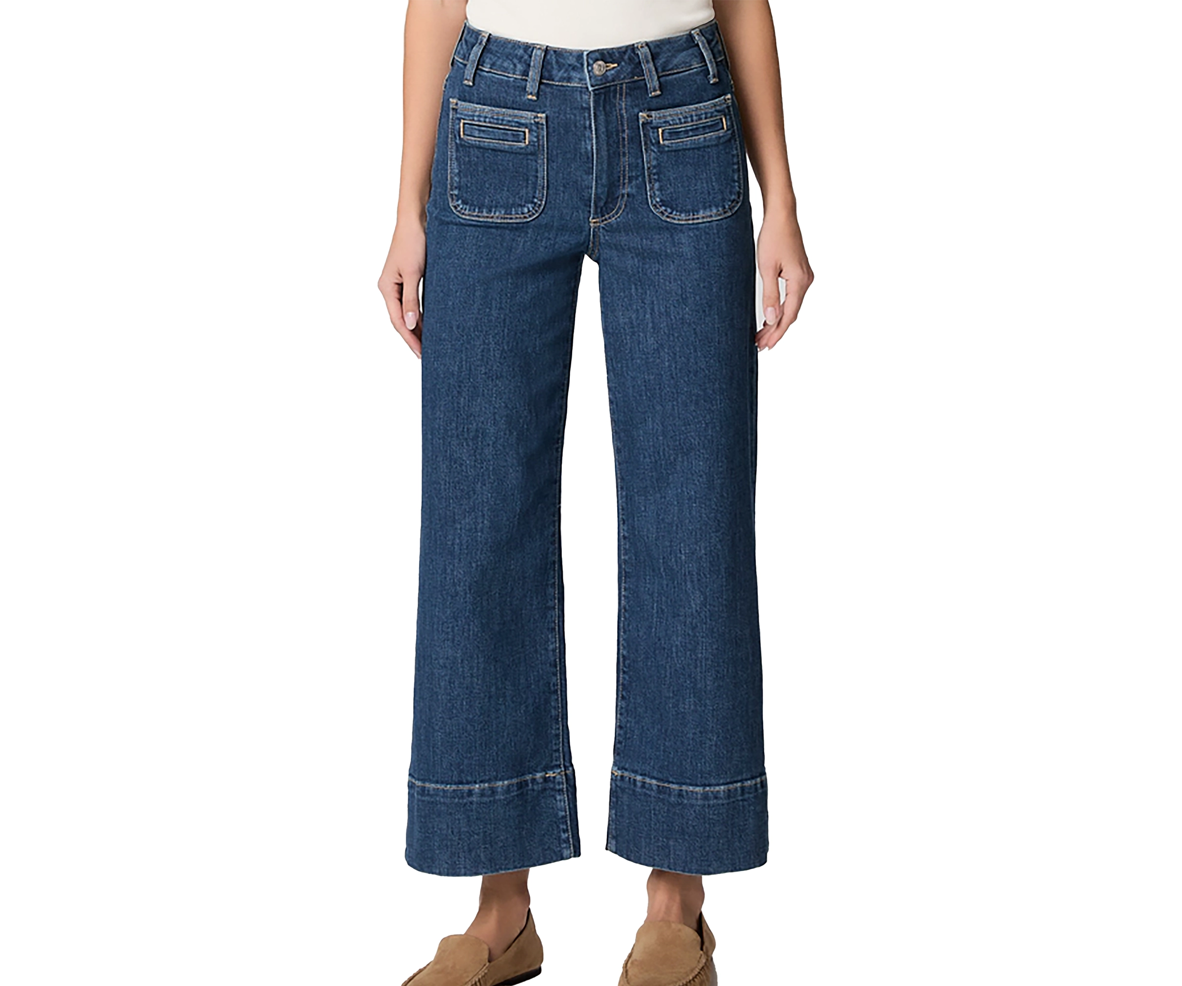 Blue jeans worn by a person on a white background