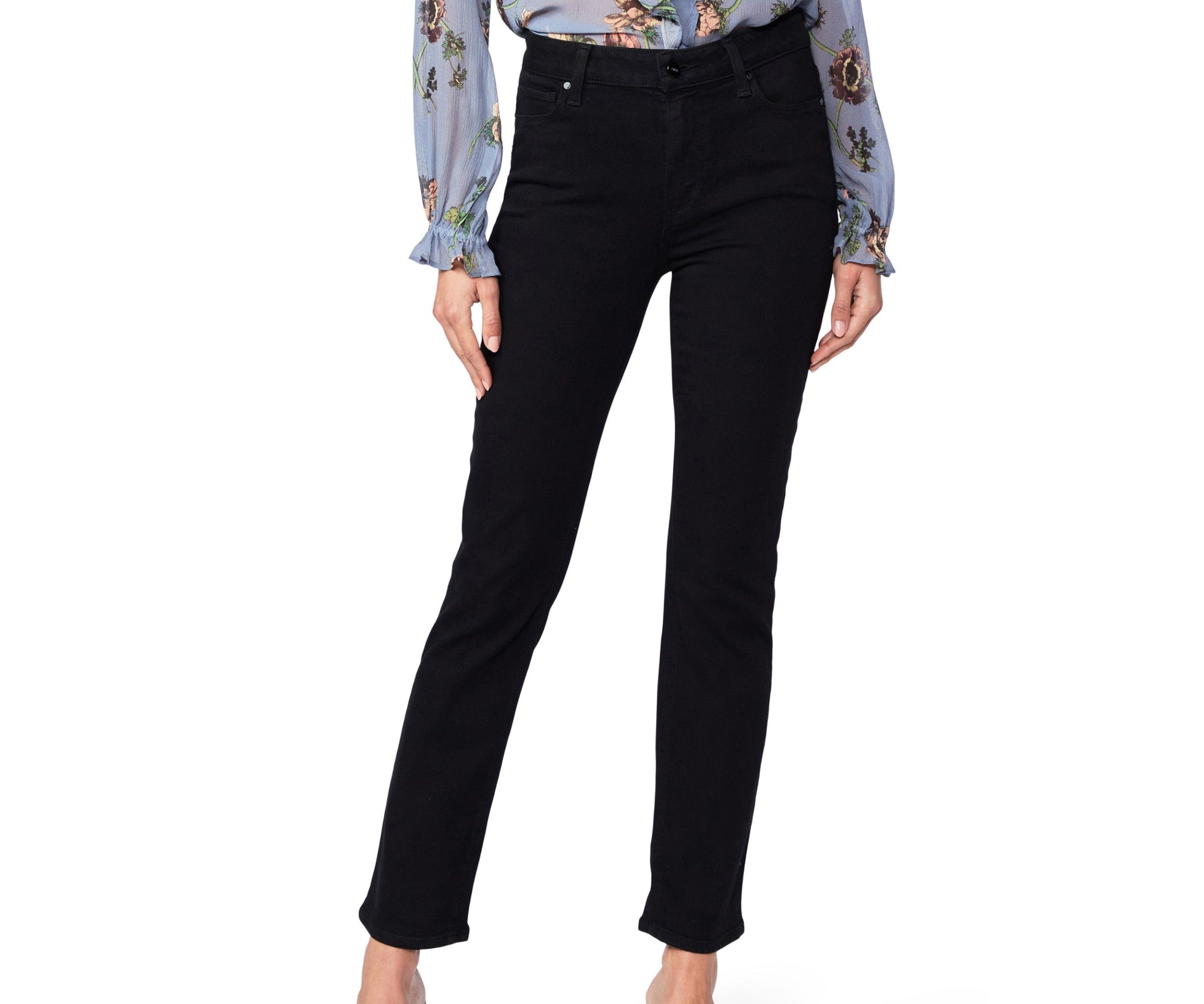 Person wearing black pants on a white background