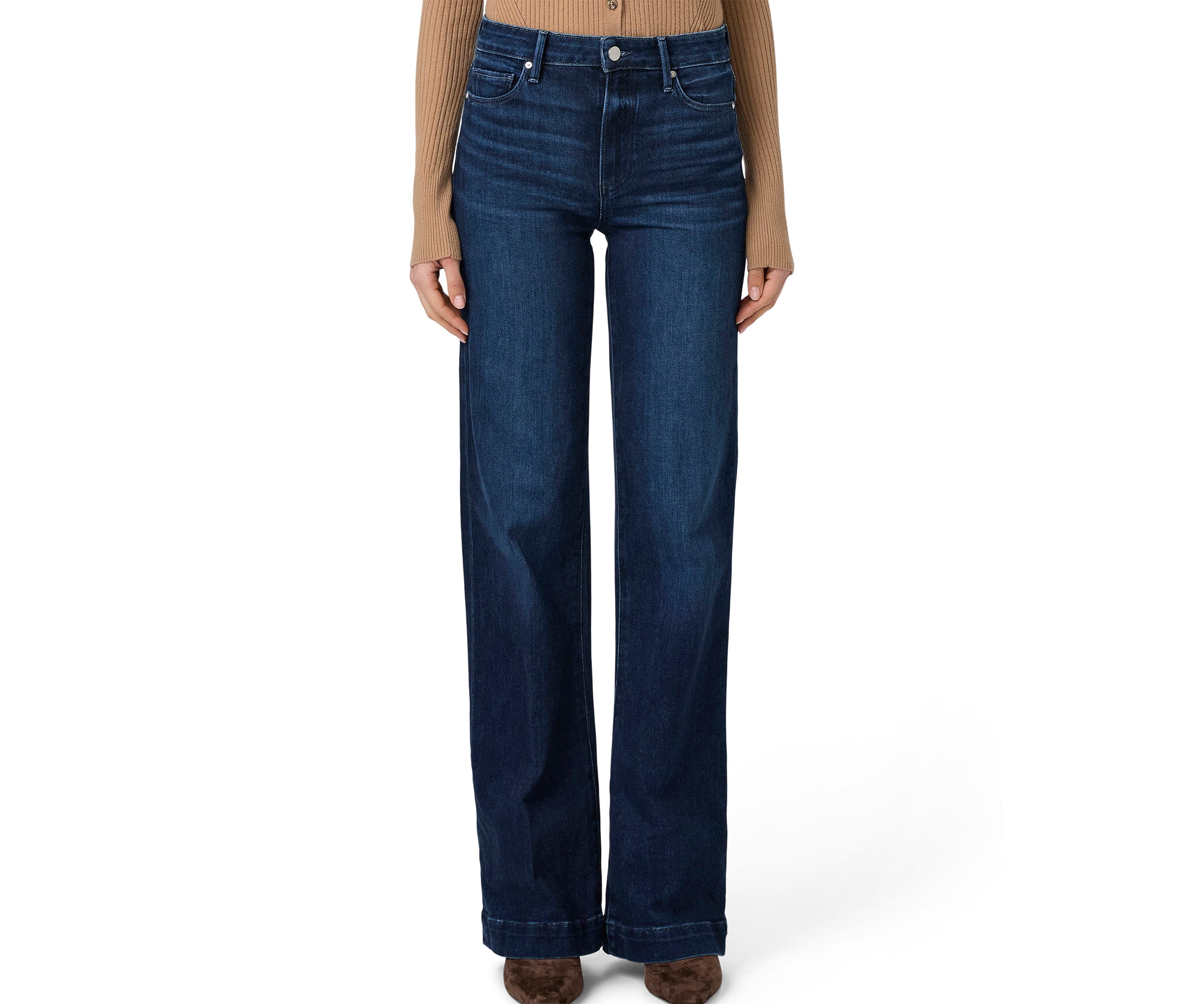 Person wearing blue jeans on a white background
