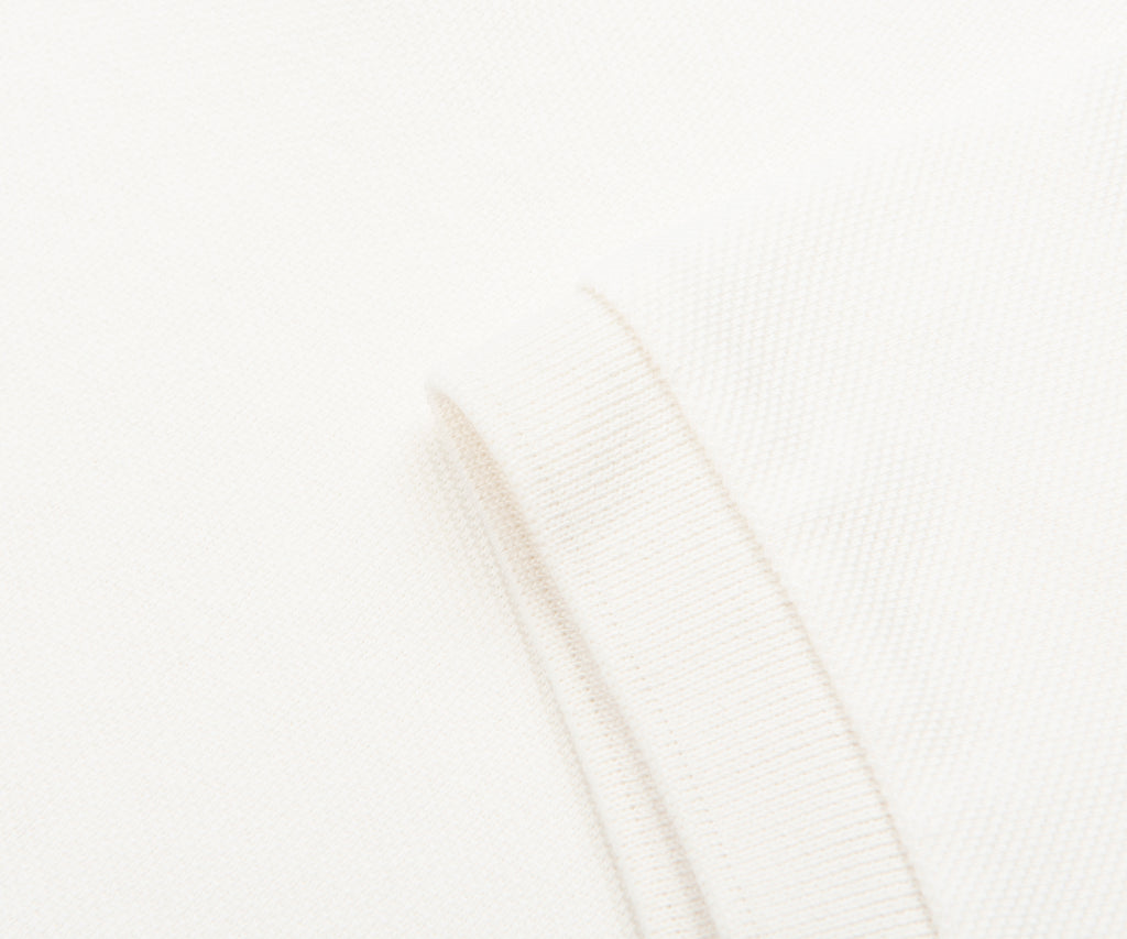 Close-up of a white textured fabric