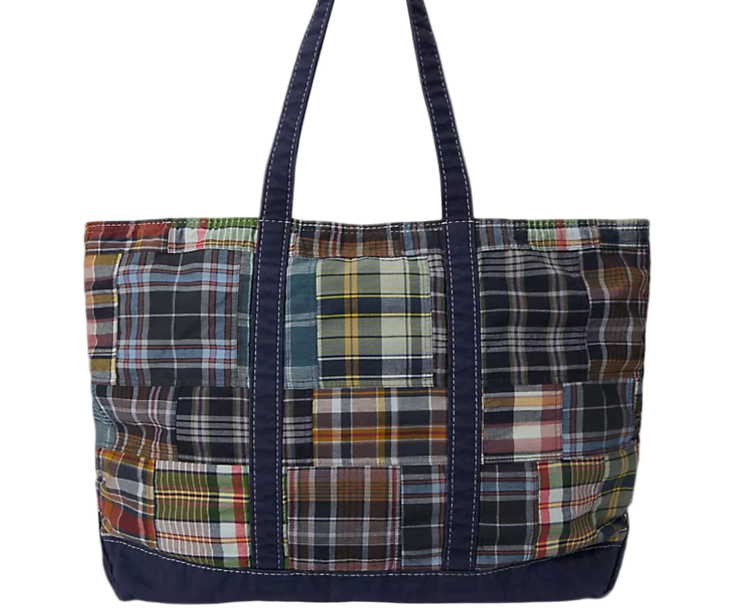 Plaid patterned tote bag with navy accents on a light gray background