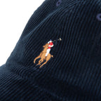 Navy blue corduroy fabric with embroidered logo on a white background